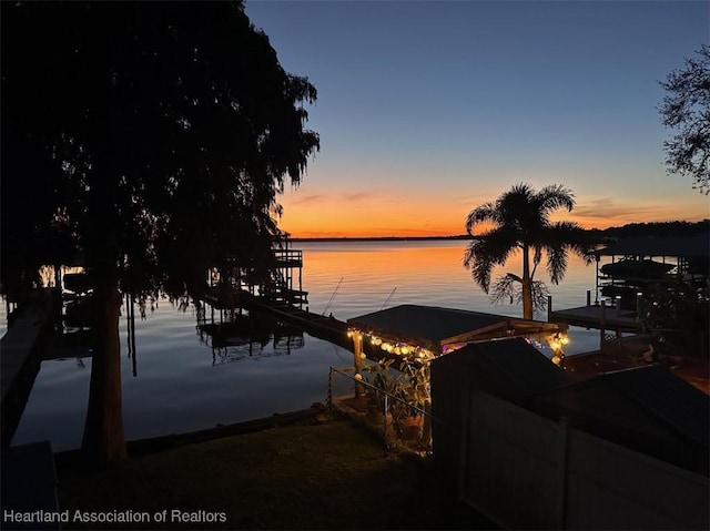 property view of water featuring a dock