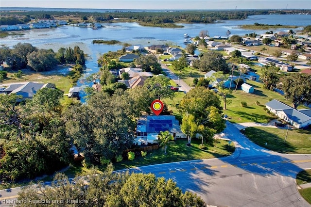 drone / aerial view with a water view