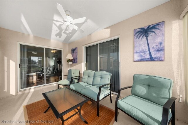 view of patio / terrace with ceiling fan and outdoor lounge area