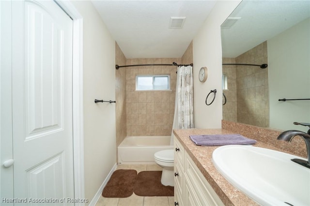 full bathroom featuring vanity, shower / bathtub combination with curtain, tile patterned floors, and toilet