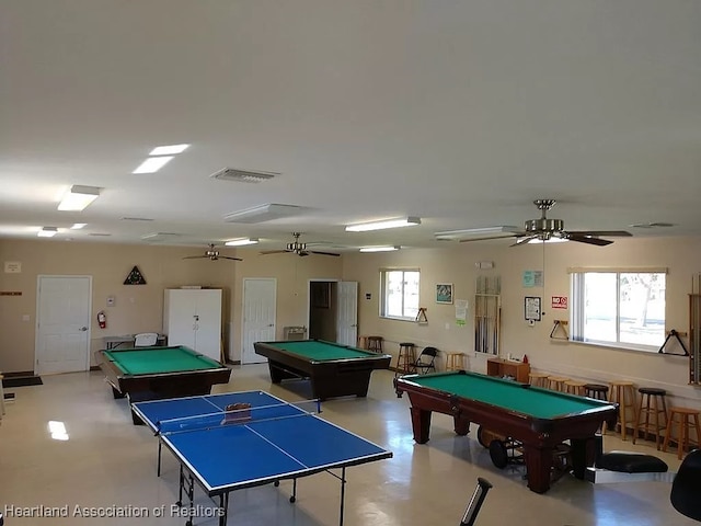 recreation room featuring a wealth of natural light, billiards, and ceiling fan