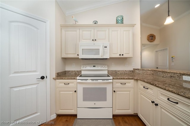 kitchen with light stone counters, dark hardwood / wood-style flooring, white appliances, and pendant lighting