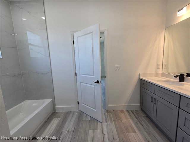 bathroom featuring vanity and wood-type flooring