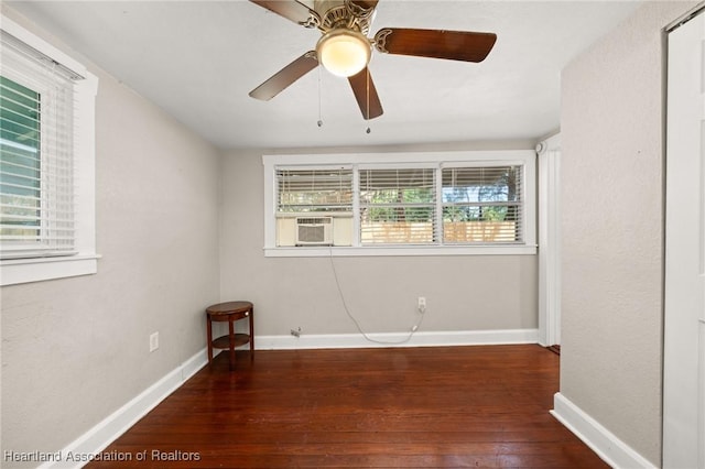 412 Rose Ave, Sebring, FL 33870 - unfurnished room featuring hardwood / wood-style floors, cooling unit, a ceiling fan, and baseboards