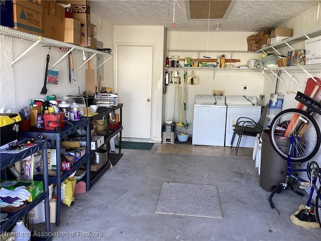 garage featuring washing machine and dryer