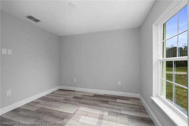 empty room with light wood-type flooring