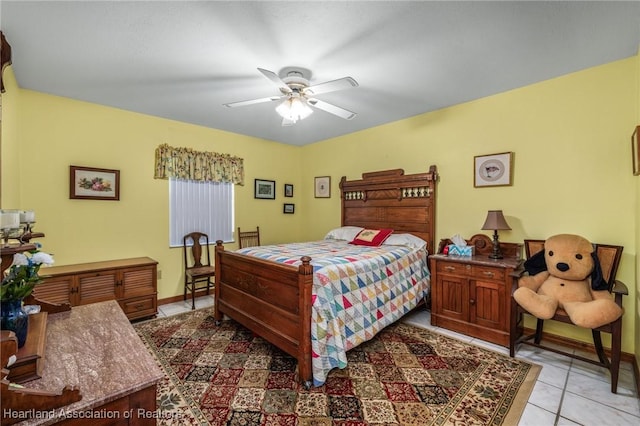 bedroom with light tile patterned floors and ceiling fan