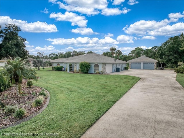 ranch-style home featuring a garage and a front lawn