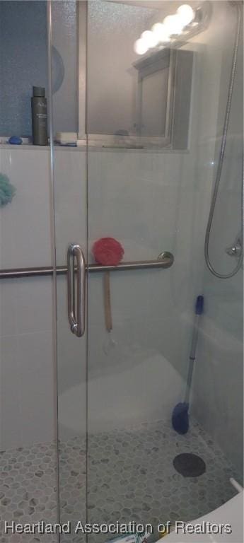 bathroom with a stall shower