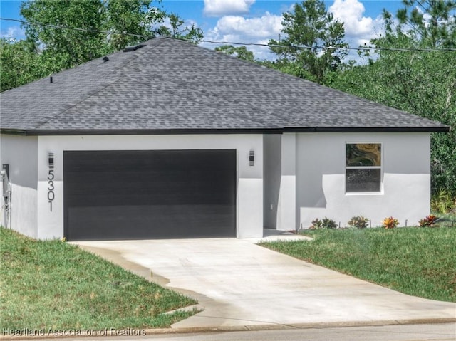 garage featuring driveway