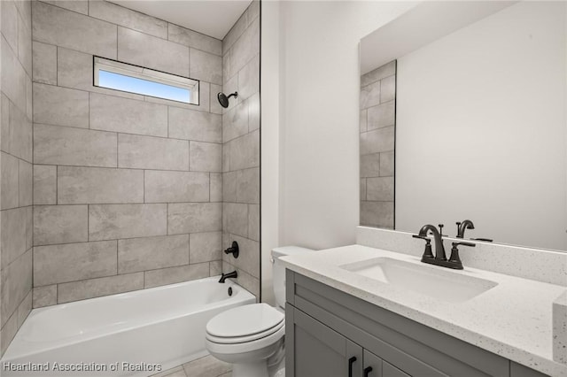 full bathroom with toilet, vanity, and tub / shower combination
