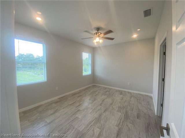 spare room featuring ceiling fan