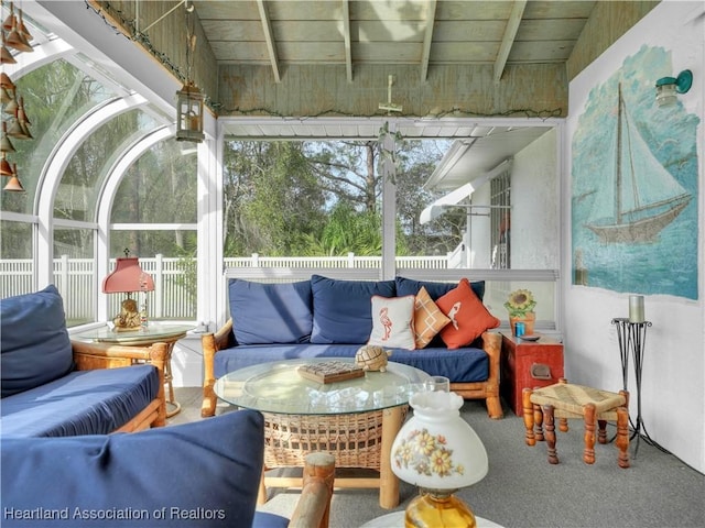 sunroom / solarium with beam ceiling