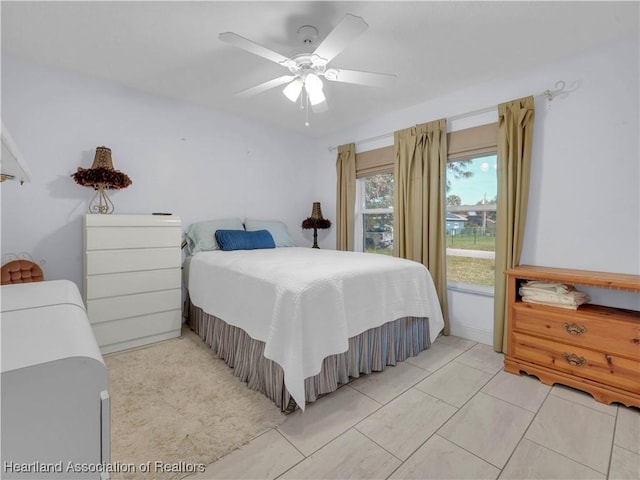 bedroom featuring ceiling fan