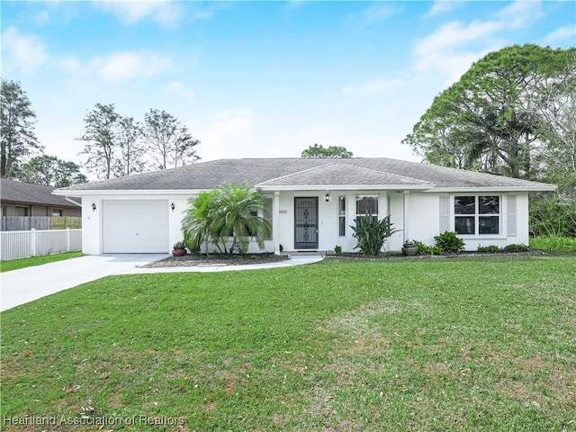 single story home with a garage and a front lawn