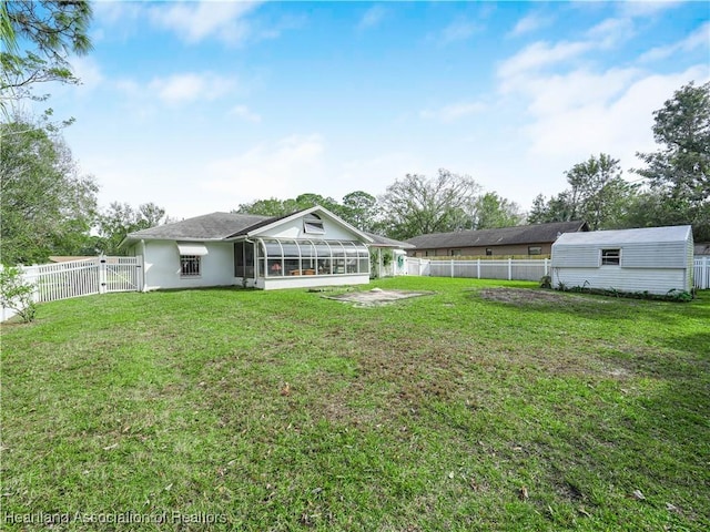 view of yard featuring a sunroom