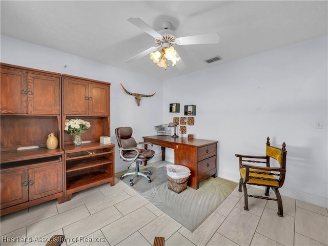 office space featuring ceiling fan