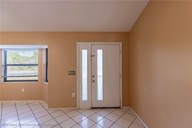 entrance foyer featuring light tile patterned floors