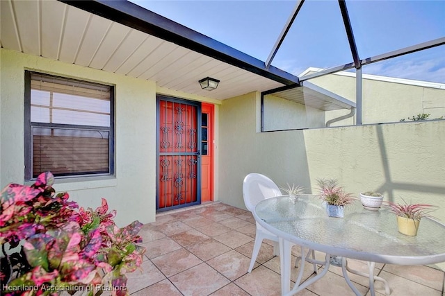 doorway to property featuring a patio