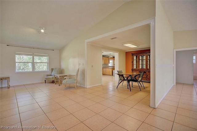 3800 Monza Dr, Sebring, FL 33872 - living area featuring light tile patterned floors and vaulted ceiling
