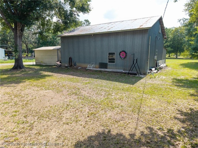 1900 N Riverdale Rd, Avon Park, FL 33825 - view of pole building featuring a yard