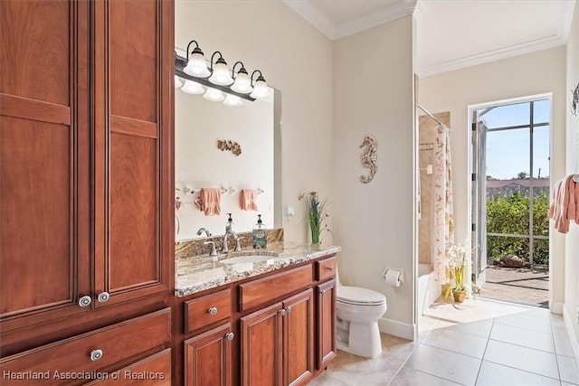 bathroom with vanity, crown molding, tile patterned floors, and toilet