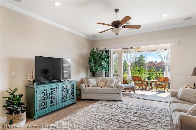 tiled living room featuring crown molding and ceiling fan