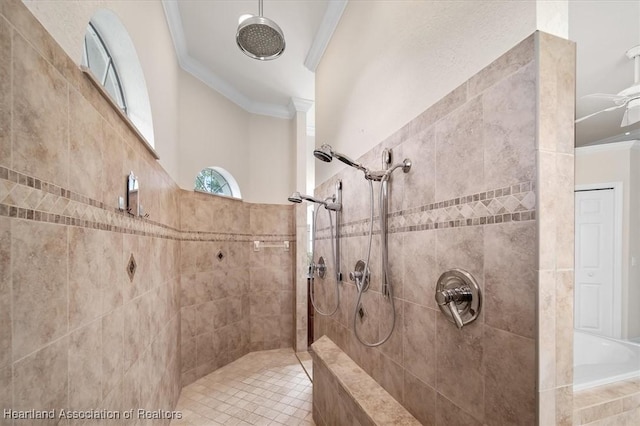 bathroom featuring a tile shower, ornamental molding, and ceiling fan