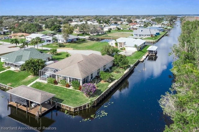 bird's eye view with a water view