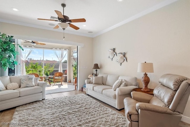 tiled living room with ceiling fan and ornamental molding