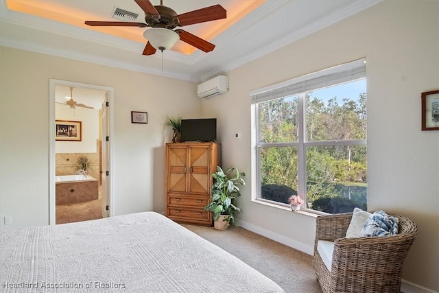 carpeted bedroom with crown molding, an AC wall unit, ceiling fan, and ensuite bath