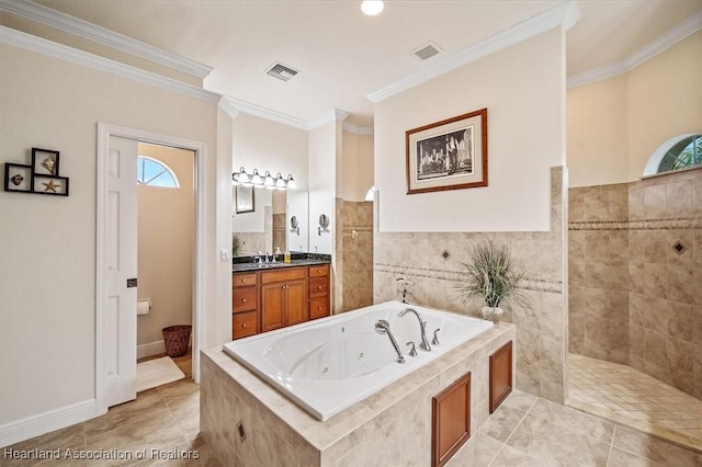 bathroom featuring vanity, tiled tub, and ornamental molding