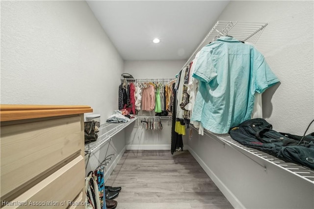 walk in closet featuring light wood-type flooring