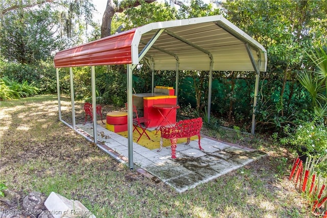 view of patio / terrace featuring a carport