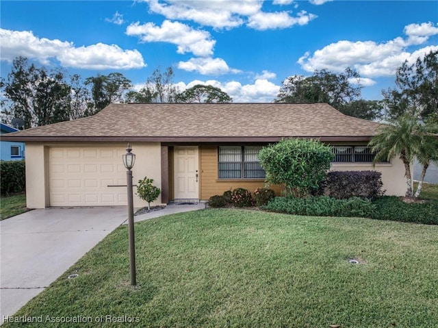 single story home with an attached garage, a shingled roof, stucco siding, concrete driveway, and a front lawn