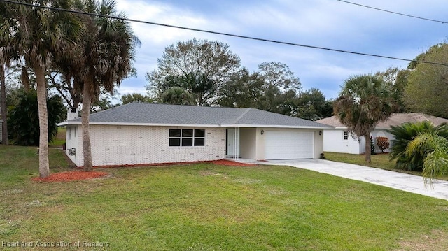 702 Catfish Rd, Lake Placid, FL 33852 - ranch-style house featuring a garage, driveway, a front yard, and brick siding