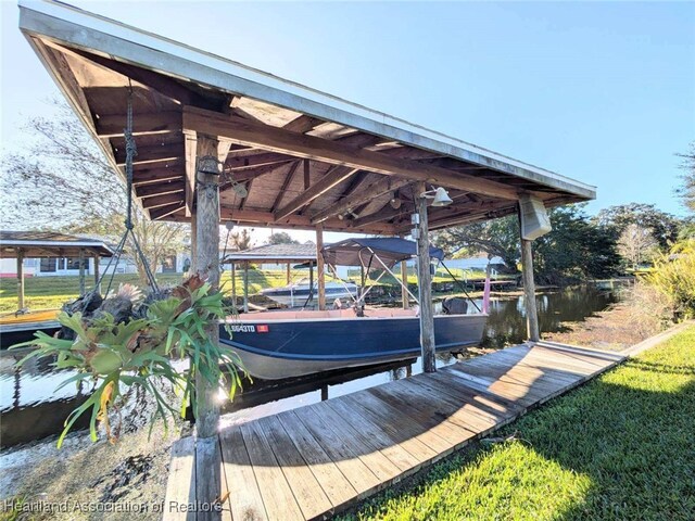 dock area featuring a water view