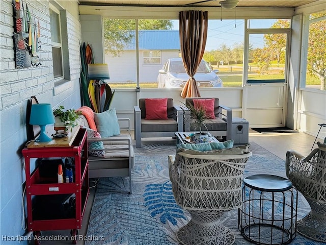 sunroom / solarium featuring a wealth of natural light