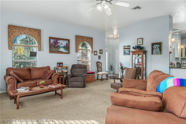 3534 Tubbs Rd, Sebring, FL 33870 - carpeted living area with a ceiling fan and healthy amount of natural light
