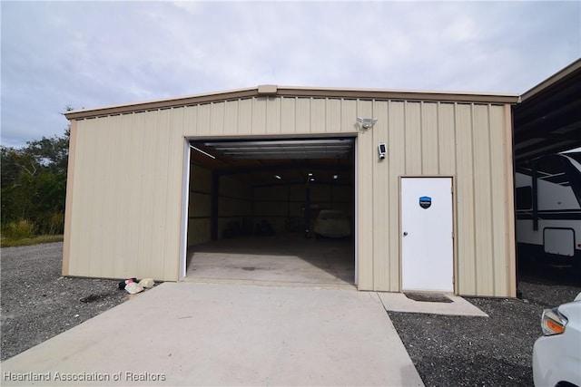 view of outdoor structure with a garage