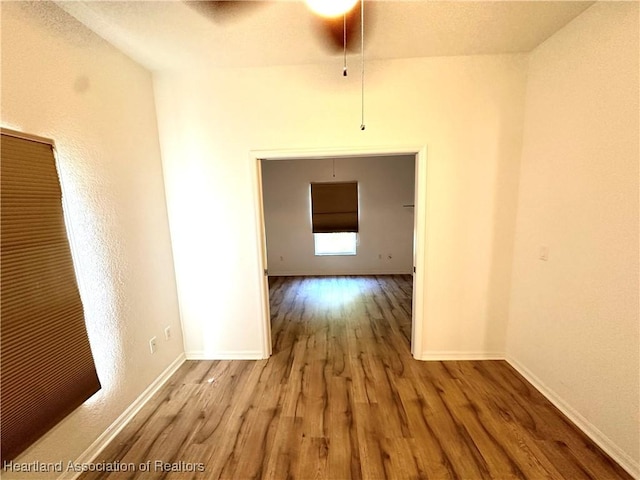 corridor featuring light hardwood / wood-style floors