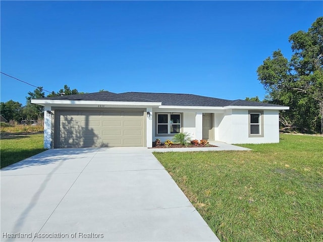 2859 N Lancaster Rd, Avon Park, FL 33825 - single story home featuring stucco siding, a front lawn, concrete driveway, and an attached garage