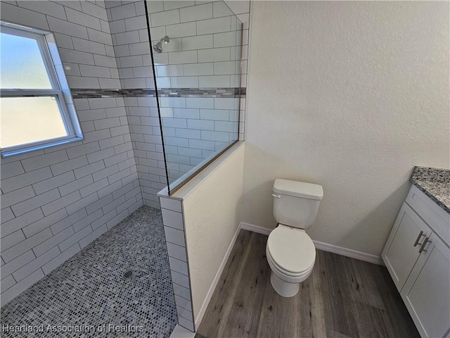 2859 N Lancaster Rd, Avon Park, FL 33825 - full bath with walk in shower, wood finished floors, toilet, and vanity