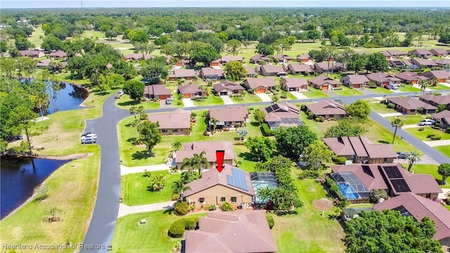 aerial view featuring a residential view and a water view
