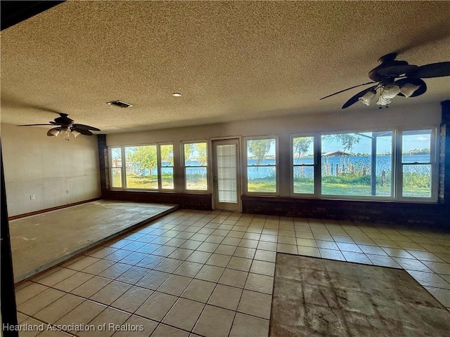 unfurnished sunroom with visible vents