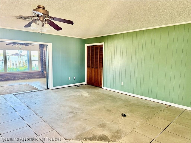 unfurnished room with crown molding, a ceiling fan, and a textured ceiling