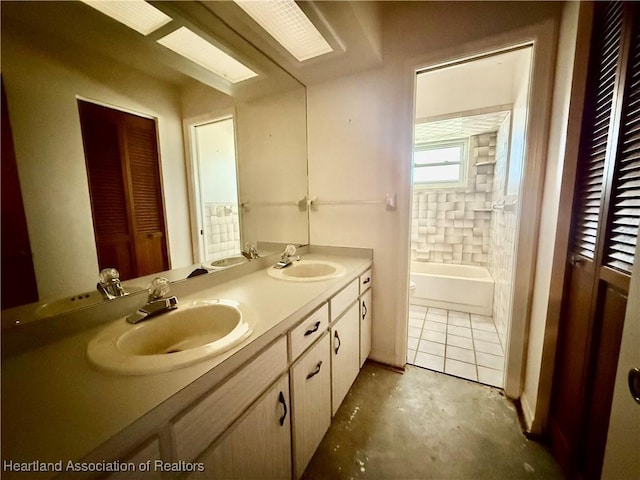 full bathroom with double vanity, a sink, and unfinished concrete floors