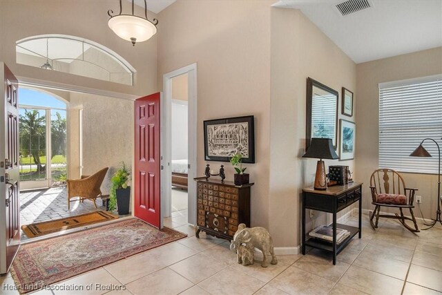 entryway featuring light tile patterned flooring