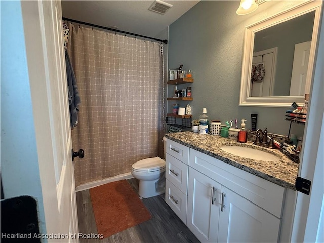 424 Branbury Ave, Lake Placid, FL 33852 - full bath with vanity, wood finished floors, and curtained shower