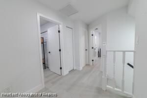 11200 S Jefferson Ave, Lake Placid, FL 33852 - corridor featuring wood finished floors